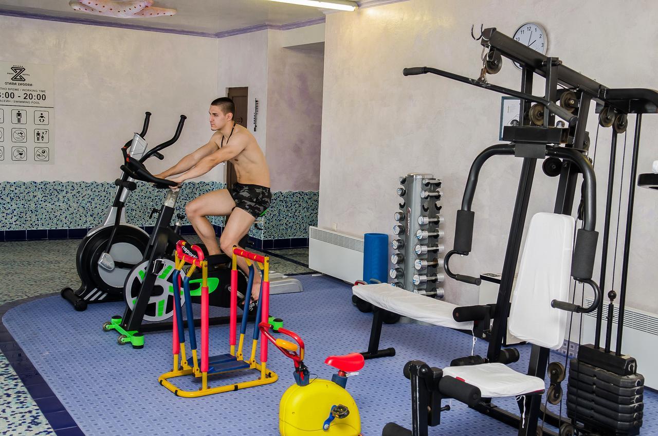 Park Hotel Stara Zagora Ngoại thất bức ảnh A man on a stationary bicycle